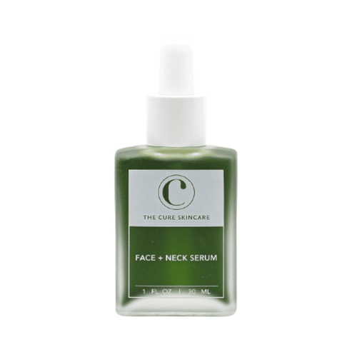 The Cure Skincare Face + Neck Serum in a green glass bottle with dropper, enriched with sea moss and collagen for dry and mature skin care.