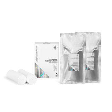 Diego dalla Palma Firming Cryo Wrap Thigh body treatment set with two silver sachets, two white wraps, and branded box for anti-cellulite care.