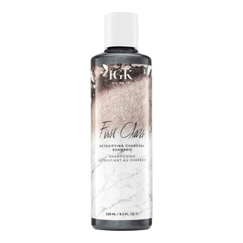 Detoxifying Charcoal Shampoo by IGK Hair with tea tree and witch hazel, designed to cleanse and restore hair health in the shampoo category.