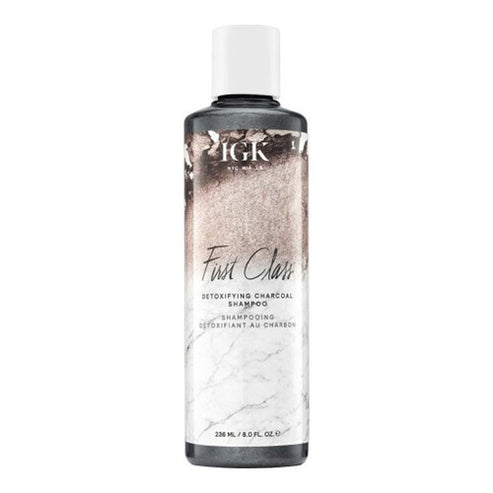 Detoxifying Charcoal Shampoo by IGK Hair with tea tree and witch hazel, designed to cleanse and restore hair health in the shampoo category.
