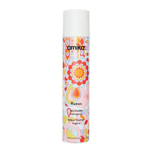 Amika Fluxus Touchable Hairspray in colorful floral packaging, offering flexible hold for all-day hair styling. Ideal for soft, touchable styles.