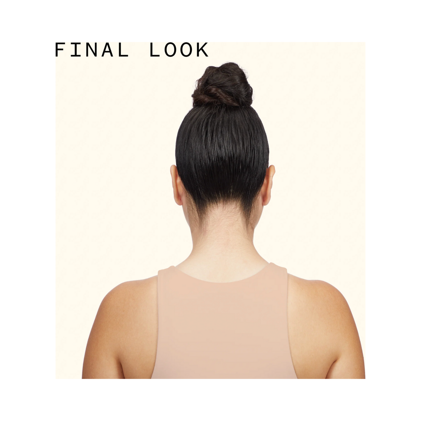 Final look of sleek, styled hair in a bun using Amika Fluxus Touchable Hairspray, showcasing smooth, frizz-free hold with flexible control.