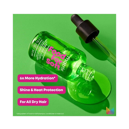 Matrix Hair Oil Serum-flaska med utspillt serum, som framhäver fördelar som 6x återfuktning, glans och värmeskydd för torrt hår.