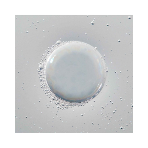 Close-up texture of Living Proof Root-Lifting Spray formula showing lightweight, invisible consistency ideal for volumizing hair treatments.