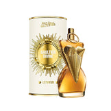 Jean Paul Gaultier Divine Eau de Parfum for women in a sculpted gold corset bottle with matching white and gold packaging. A floral, sweet fragrance.
