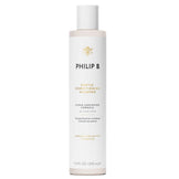 Shea Butter Conditioning Shampoo by Philip B in sleek 7.4 fl oz packaging, designed for gentle, unscented hair care and color-safe cleansing.