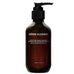 Primo piano del flacone di detergente viso gel delicato Grown Alchemist con pompa per la pulizia del viso