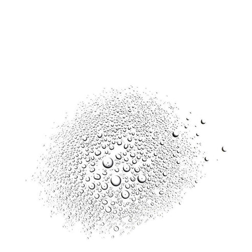 Close-up of fine mist spray droplets representing the lightweight texture of Payot Gentle Toning Mist for face and eyes.