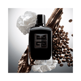 Givenchy Gentleman Society Extreme bottle surrounded by daffodil, wood, and coffee beans. Highlights floral woody fragrance composition.