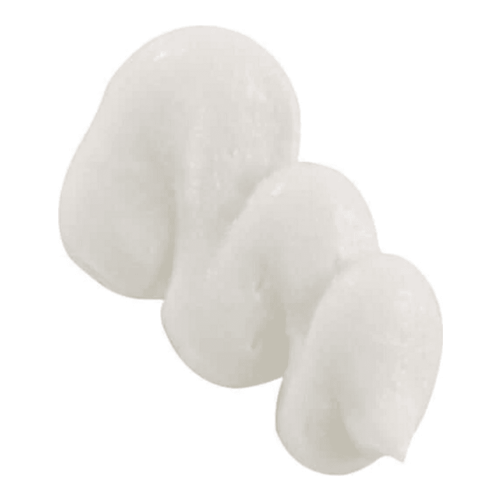 Creamy white texture of CosMedix Glow Mask with bamboo and vitamin C. Exfoliates and brightens for radiant, even-toned skin.