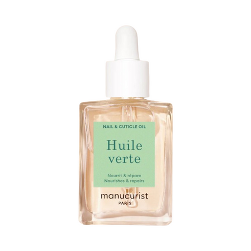 Manucurist Green Oil nail and cuticle treatment in a clear glass dropper bottle, best green nail care oil for nourishing and repairing nails.