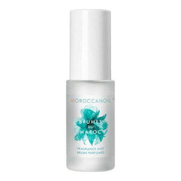 Moroccanoil Fragrance Mist - Hair & Body Spray in frosted bottle with teal floral design. Amber and floral scent ideal for refreshing hair and skin.