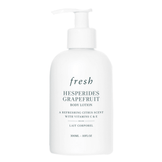 Grapefruit Body Lotion by Fresh featuring a sleek white bottle design, ideal for body care with citrus scent and nourishing ingredients like jojoba and lemon.