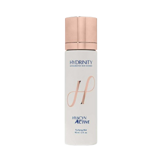 Hydrinity Hyacyn Active toner i elegant hvit flaske med metallhette, perfekt for daglig hudforyngelse og hydreringsritualer.