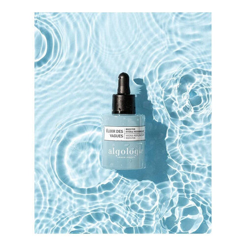 Algologie Hydra-Replenish Booster serum bottle floating in clear water, symbolizing hydration and skin replenishment with hyaluronic acid.
