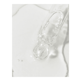 Transparent drop of VivierSkin Kine-C Serum on skin, highlighting its smooth, absorbent texture ideal for mature skin treatment.