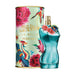Women's fragrance Jean Paul Gaultier La Belle perfume featuring blue lotus and vanilla, in a sculpted bottle with tropical floral-themed box.