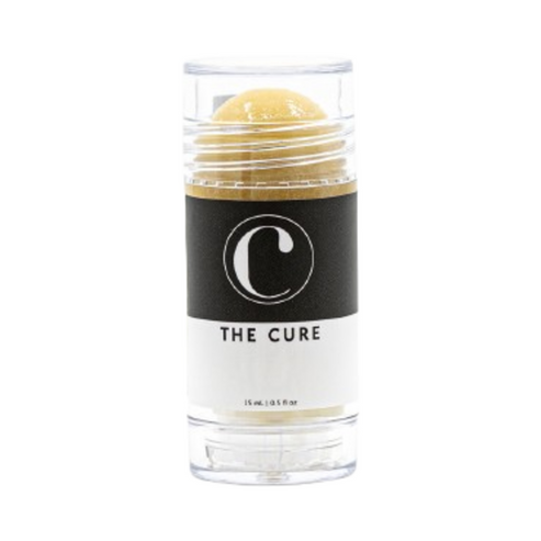 The Cure Skincare Lip Balm featuring dome-shaped balm in sleek transparent packaging. Ideal for daily lip care and moisture retention.