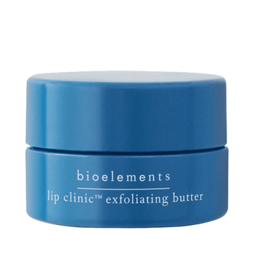 Bioelements Lip Clinic: Exfoliating Butter in a sleek blue jar, ideal for overnight lip renewal with AHAs and shea butter.