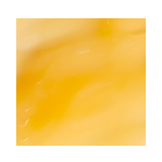 Close-up texture of Bioelements Lip Clinic Hydrating Serum showing its rich, golden formula packed with rose and shea butter for lip hydration.