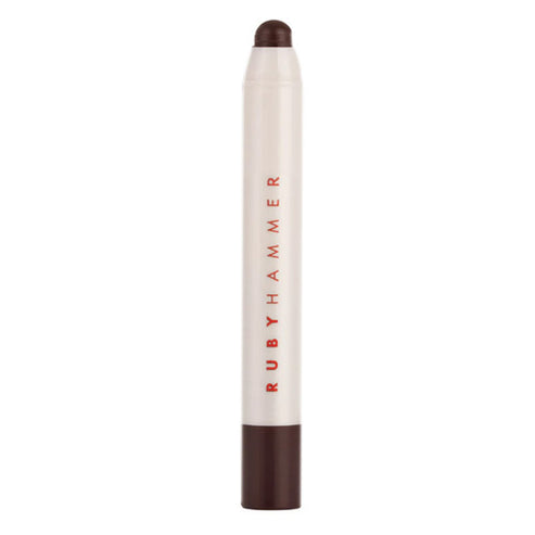 Ruby Hammer Lip Serum Balm in deep brown tone. Richly pigmented lip treatment with hydrating formula in a modern twist-up stick.