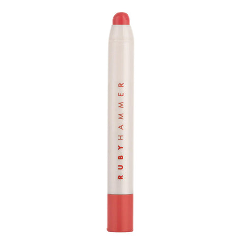 Ruby Hammer Lip Serum Balm in coral pink hue. Nourishing lip care product designed for softness and shine in a sleek applicator.