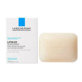 La Roche Posay Lipikar Cleansing Bar for dry skin, shown with packaging. Lipid-enriched soap ideal for sensitive body and face cleansing.