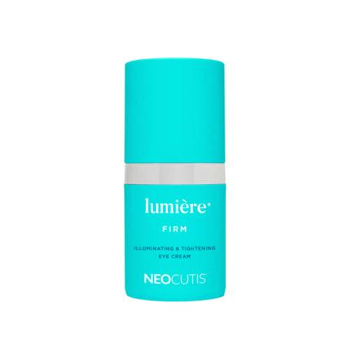 NeoCutis Lumiere Eye Cream in turquoise bottle for firming and illuminating under eyes. Anti-aging treatment for dark circles and fine lines.