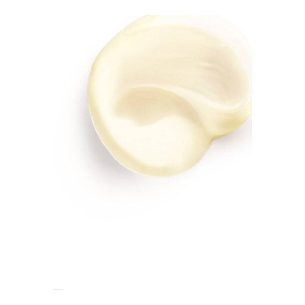 Creamy texture of Leonor Greyl Masque Orchidee hair treatment shown in a swirl. Rich formula for nourishing and smoothing frizzy hair.