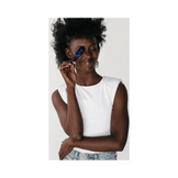 Model holding Circadia MeriStem Serum near her face, showcasing anti-aging skincare benefits for mature skin and improved firmness and elasticity.