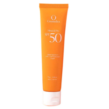 O Cosmedics Mineral Pro SPF 50 Untinted sunscreen in an orange 75g tube, offering broad-spectrum UVA/UVB protection with Zinc Oxide and Vitamin E.