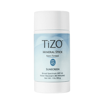 TiZO Mineral Stick Non Tinted Sunscreen SPF 45 in a compact white and blue container, ideal for daily antioxidant skin protection.