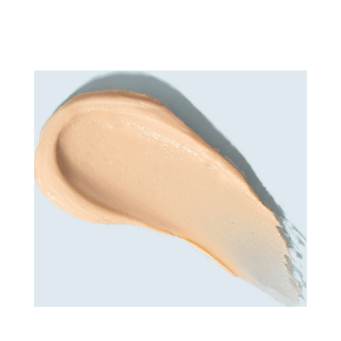 Close-up of TiZO Mineral Stick Tinted sunscreen texture showing smooth, blendable formula with a natural tint finish.
