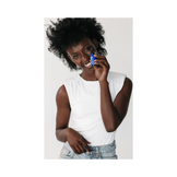 Model holding Circadia Moisture On Demand 1 oz serum, showcasing lightweight facial moisturizer for dry skin in personal care routine.