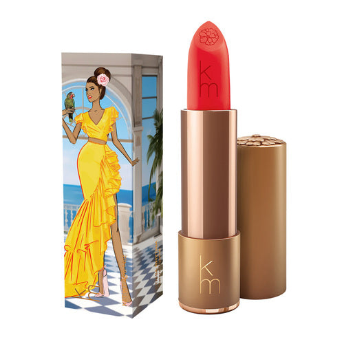 Karen Murrell Lipstick - Natural Nude Lipstick | 4 ml / 0.14 oz in bright pink with packaging featuring a woman in a pink robe at a vanity.