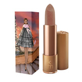 Karen Murrell Lipstick - Natural Nude Lipstick | 4 ml / 0.14 oz in warm nude with winter-themed box showing a woman in pink ski gear.