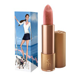 Karen Murrell Lipstick - Natural Nude Lipstick | 4 ml / 0.14 oz in soft rose with illustrated box of a woman in a trench coat and sunglasses.