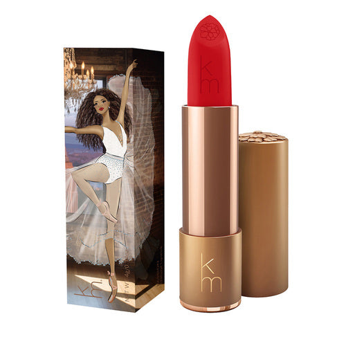 Karen Murrell Lipstick - Natural Nude Lipstick | 4 ml / 0.14 oz in orange red with illustrated box of a woman in a red dress by the Statue of Liberty.