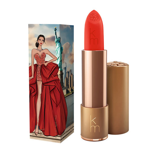Karen Murrell Lipstick - Natural Nude Lipstick | 4 ml / 0.14 oz in lavender pink with illustrated box of a woman in purple on a bicycle in a cityscape.