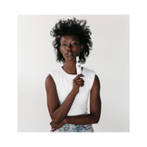 Model holding Circadia Night Time Control 2 oz acne treatment serum, ideal for nighttime skincare routine. Shop now at eSkincareStore.