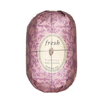 Fresh Oval Soap - Freesia wrapped in elegant pink floral paper, enriched with shea butter for moisturizing body care. Ideal for daily shower use.