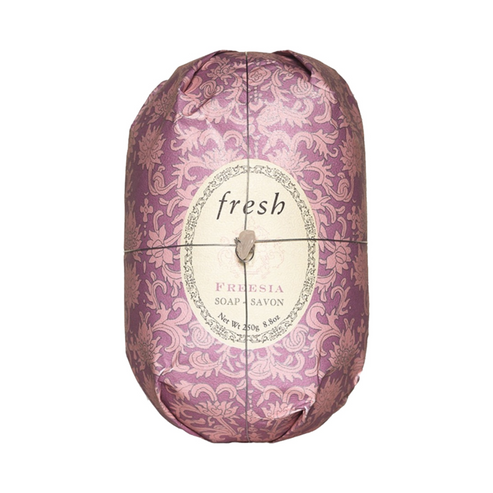Fresh Oval Soap - Freesia wrapped in elegant pink floral paper, enriched with shea butter for moisturizing body care. Ideal for daily shower use.