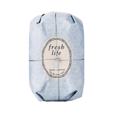 Fresh Oval Soap - Fresh Life wrapped in elegant blue floral paper, a vegetable-based body soap with shea butter for moisturizing skin.