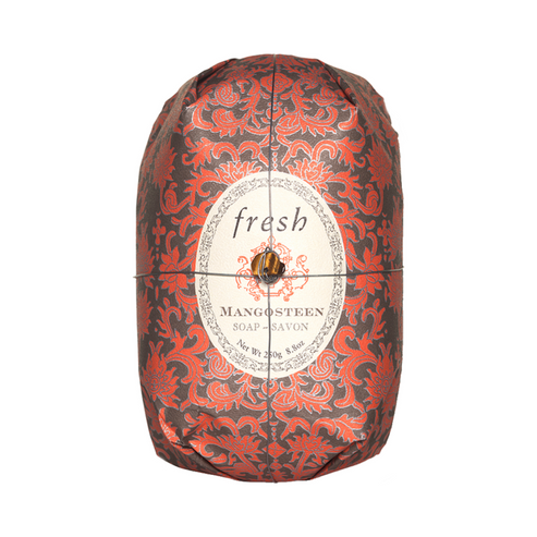 Fresh Oval Soap - Mangosteen Soap Oval wrapped in elegant red floral paper with moisturizing shea butter for a luxurious body wash experience.