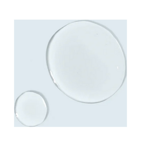 Clear gel texture of TiZO Gentle Amino Cleanser shown in droplets. Lightweight formula designed to cleanse and hydrate skin effectively.