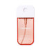 Close do frasco de névoa da fragrância Touchland Peachy Lychee