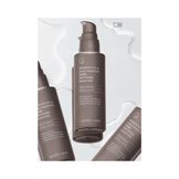 Flat lay of Allies of Skin Prebiotics & Niacinamide Serum bottles with serum texture. Enhances skin clarity and reduces visible pores.