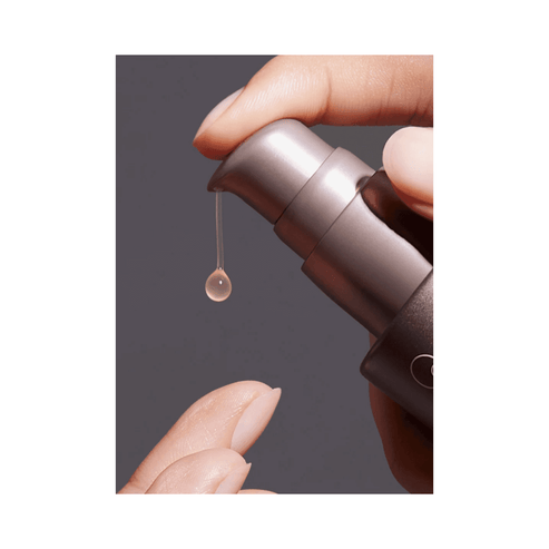 Close-up of Allies of Skin Prebiotics & Niacinamide Serum being dispensed from pump. Lightweight formula targets pores and brightens skin tone.