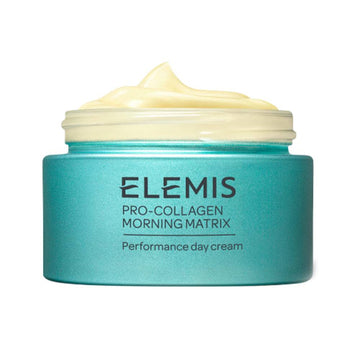 Elemis Pro-Collagen Moisturizer in teal jar with creamy texture, designed to improve firmness and elasticity. Silicone-free anti-ageing day cream.