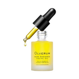 Olverum Pure Radiance Facial Oil with dropper dispensing golden oil, ideal for brightening skin and reducing fine lines in skincare routines.